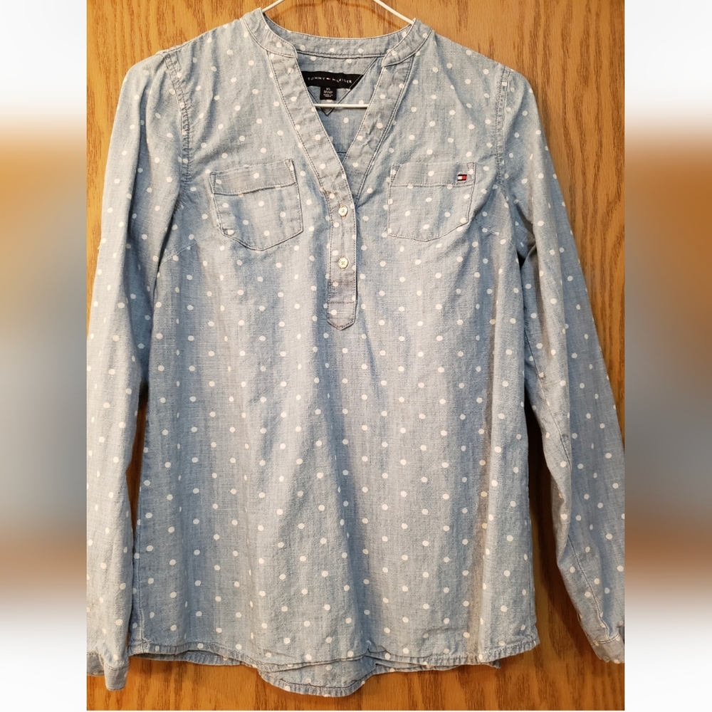 Cute light blue, long sleeve denim, button up shirt.